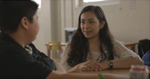 teens talking at a table